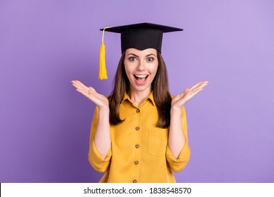 Photo of cute lady open mouth raise palms clap excited wear yellow shirt college cap isolated purple color background