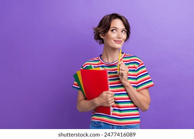 Photo of cute pretty minded girl dressed trendy striped clothes looking empty space offer isolated on purple color background - Powered by Shutterstock