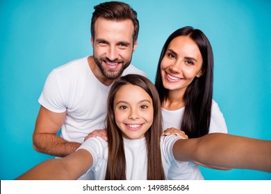 Photo of daddy mommy and small lady making selfies wear casual outfit isolated blue background - Powered by Shutterstock