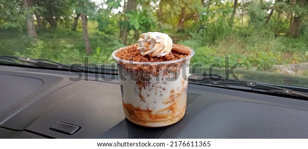 Photo of Dessert on the\
car dashboard