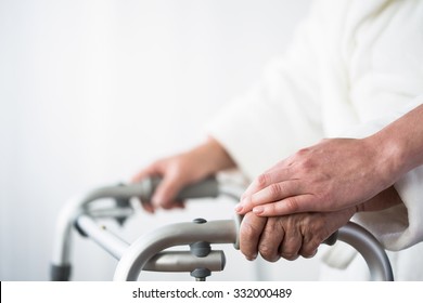 Photo Of Disabled Old Person With Walking Aid