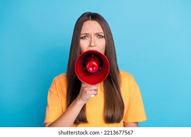 Photo Of Dissatisfied Furious Lady Hand Arm Hold Megaphone Say Announce Bad News Isolated On Blue Color Background