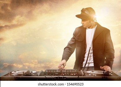 Photo Of Dj Working At Sunset