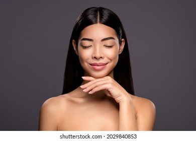 Photo Of Dreamy Inspired Model Stunning Korean Brunette Lady Hand Chin Isolated Grey Color Background