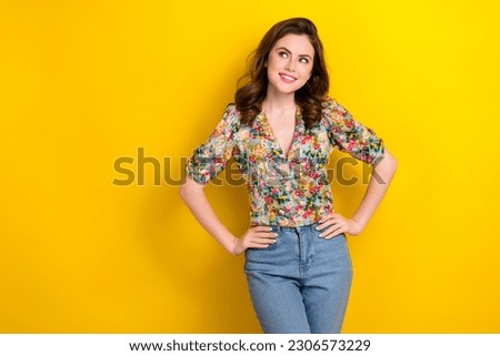 Photo of dreamy pretty lady wear retro flower print blouse looking empty space isolated yellow color background