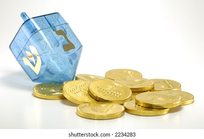 Photo Of A Dreidel And Gelt (Candy Coins) - Chanukah Related Objects