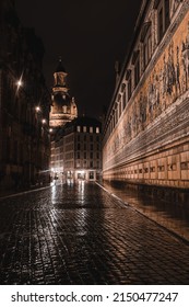 Photo From Dresden Old Town On A Rainy Night With The City Lights Reflecting Off The Wet Ground