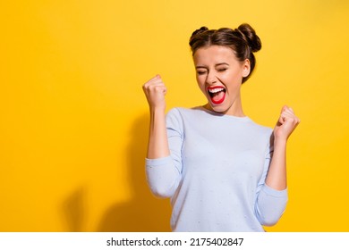 Photo of ecstatic lady shout loud yeah fist up raise win lottery isolated bright shine color background - Shutterstock ID 2175402847