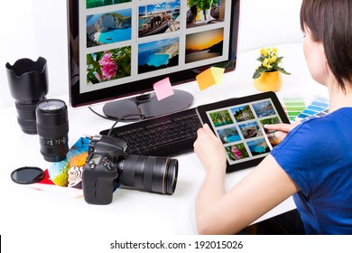 Photo editor working on computer and used graphics tablet. - Powered by Shutterstock