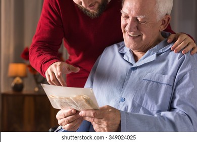 Photo Of Elderly Man With Critical Illness Having Positive Attitude