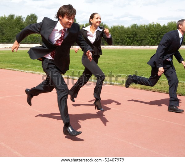 Photo Energetic Business People Suits Running Stock Photo 52407979 Shutterstock