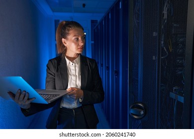Photo Of Engineer Businesswoman In Network Server Room