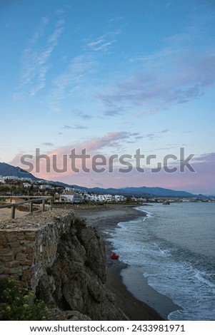 Similar – Evening view from above of the bay, the sandy beach and the old town of Sperlonga (southern Italy)