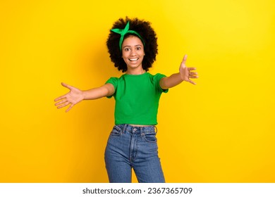 Photo of excited cheerful person toothy smile raise opened arms welcome you isolated on yellow color background - Shutterstock ID 2367365709