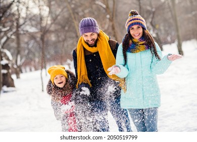 Photo of excited family happy positive smile mommy daddy daughter have fun playful snowy walk park free time
