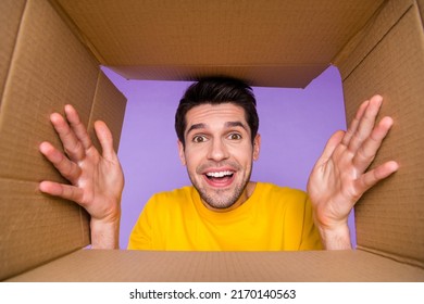 Photo Of Excited Good Mood Male Open Carton Box Receive Important Delivery Isolated On Violet Color Background