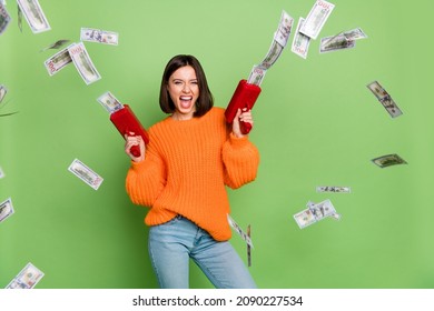 Photo Of Excited Lady Shoot Gun Dollars Business Earnins Casino Victory Wear Orange Pullover Isolated Over Green Color Background