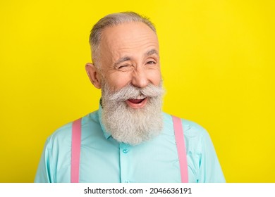 Photo of excited mature man blink wear blue shirt isolated on vivid yellow color background - Shutterstock ID 2046636191
