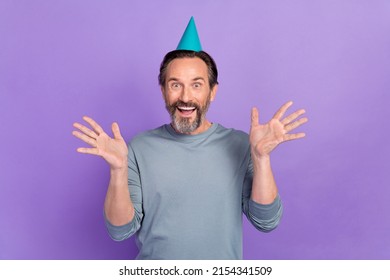 Photo Of Excited Mature Man Good Mood Unexpected Event Headwear Isolated Over Violet Color Background