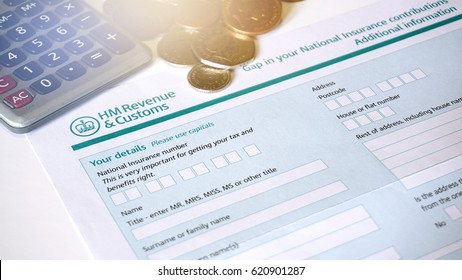 Photo Of Filling In A HM Customs Form A Personal Details For UK Self Assessment Tax And Benefits Right.