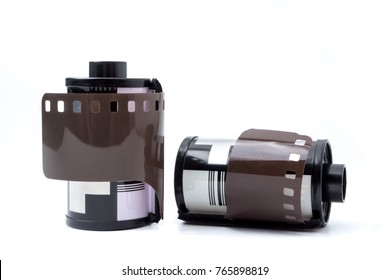 Photo Film In Cartridge, Photographic Roll Film 35 Mm On A White Background.