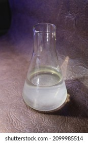 Photo Of Flasks With Chemical Reagents. Chemical Raw Materials. Flasks With Acid