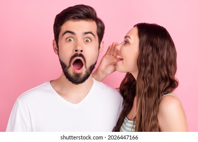 Photo Of Flirty Girl Whisper Secret Ear Shocked Excited Man Open Mouth Wear Casual Outfit Isolated Pink Color Background