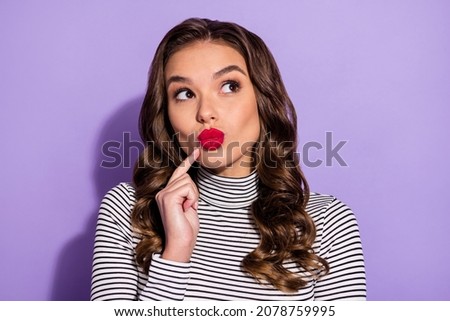 Photo of flirty shiny young woman wear striped outfit pointing finger pouted lips isolated violet color background