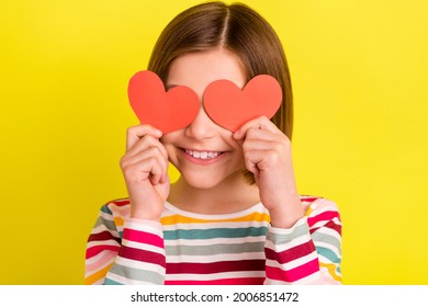 Photo Of Flirty Short Hairdo Young Girl Cover Eyes Hearts Wear Colorful Shirt Isolated On Vivid Yellow Color Background