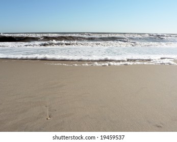 Photo Of A Foamy Surf On Virginia Beach That Includes Copy And Crop Space