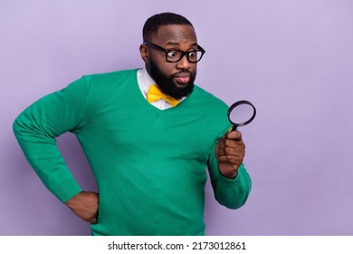 Photo Of Focused Concentrated Person Look Magnifier Loupe Isolated On Violet Color Background