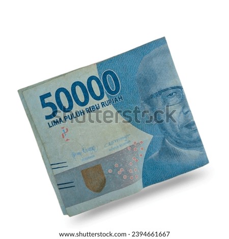 Photo of a folded 50.000 indonesian rupiah banknote isolated on a white background