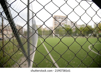 Photo Of A Football Field Behind A Net, Lines On A Football Field, Football Field Goal, Football Field Goal Net Soccer Game