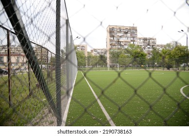 Photo Of A Football Field Behind A Net, Lines On A Football Field, Football Field Goal, Football Field Goal Net Soccer Game