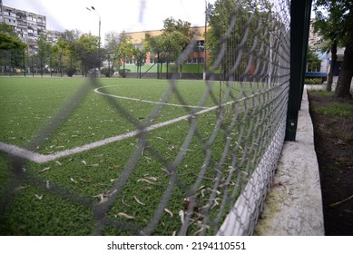 Photo Of A Football Field Behind A Net, Lines On A Football Field, Football Field Goal, Football Field Goal Net Soccer Game