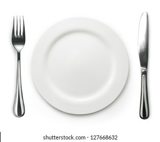 Photo of the fork and knife with white plate on white background
