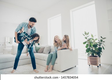 Photo Of Four People Foster Family Moving Like Airplane With Help Parents Hands Cozy Apartments Indoors