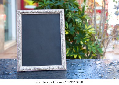 Photo Frame With Drops Of Water. Mock Up.