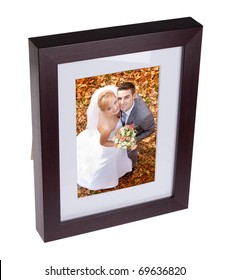 Photo Frame With Picture Of Happy Couple On Their Wedding Day