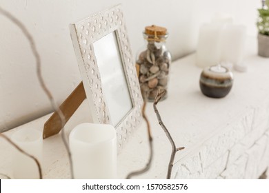 Photo Frame Stands On A Mantelpiece