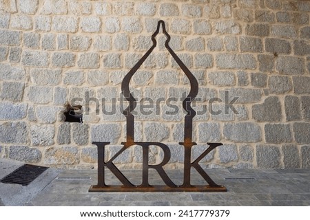 Photo frame with town inscription of Krk town, Krk island, Croatia. Iron statue of town name. Krk town sign. 