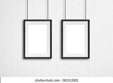 Photo Frames Hanging On Cords Against White Bricks Wall, Interior Decor Mockup