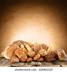 photo of fresh bread and wall of brown color  - Shutterstock ID 220402129
