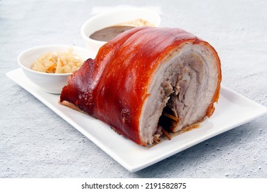 Photo of freshly cooked Filipino food called Lechon Pork Belly or roasted pork belly. - Shutterstock ID 2191582875
