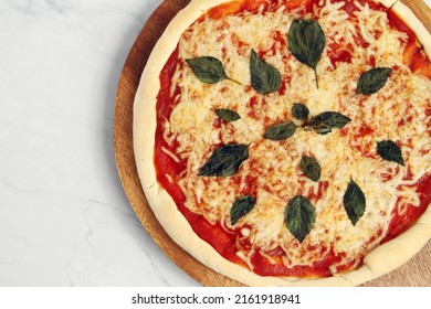 Photo Of Freshly Cooked Margharita Pizza.