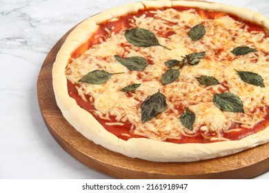 Photo Of Freshly Cooked Margharita Pizza.