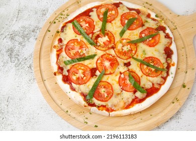 Photo Of Freshly Cooked Margharita Pizza.