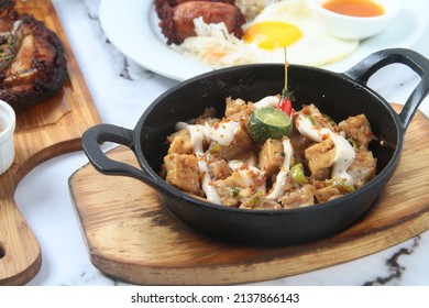 Photo of freshly cooked sizzling tofu or soy bean curd.
