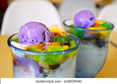 Photo of freshly made Halo Halo or ice shavings with milk and sugar topped with ice cream and other sweet ingredients. - Shutterstock ID 1628539540