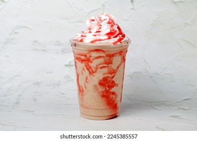 Photo of freshly made strawberry flavored frappe.